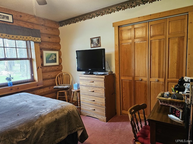 2051 Town Rd M Rd, Florence T-Wi, WI 54121 - carpeted bedroom featuring rustic walls, a closet, and ceiling fan
