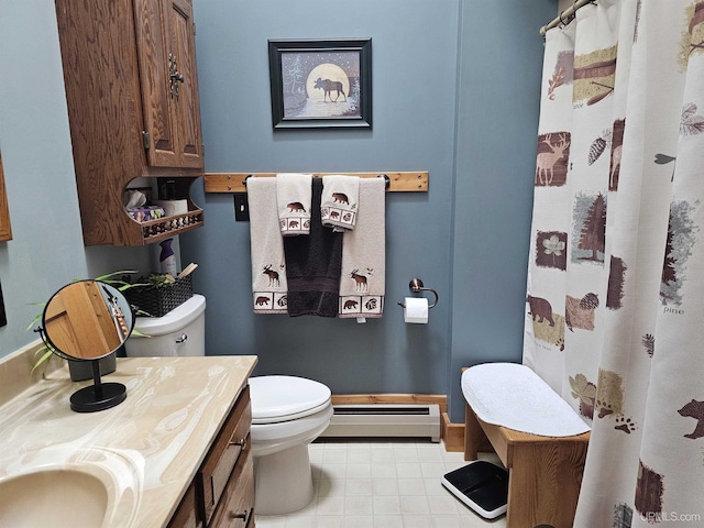 2051 Town Rd M Rd, Florence T-Wi, WI 54121 - bathroom featuring a baseboard radiator, toilet, vanity, a shower with curtain, and tile patterned flooring