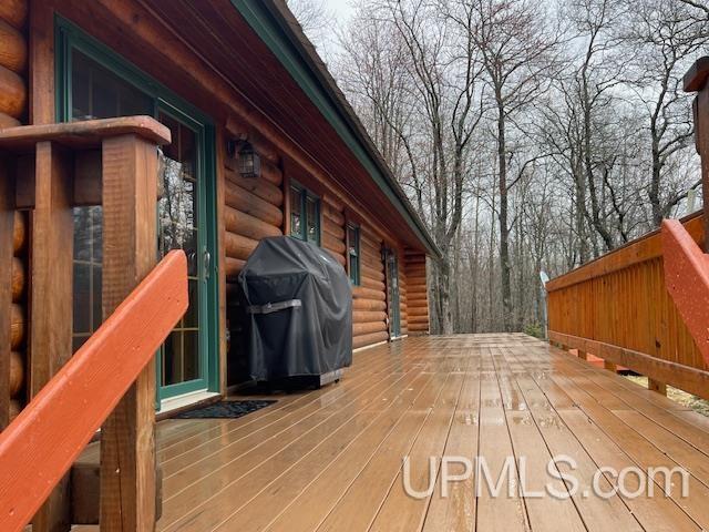 2051 Town Rd M Rd, Florence T-Wi, WI 54121 - wooden terrace featuring grilling area