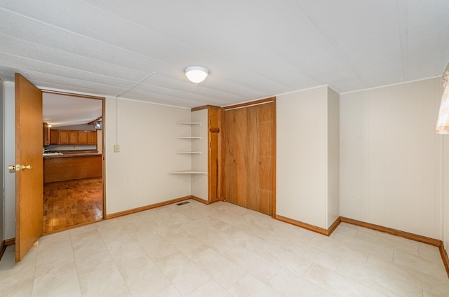 122 Shady Grove Ln, Roscommon, MI 48653 - spare room featuring baseboards and light flooring