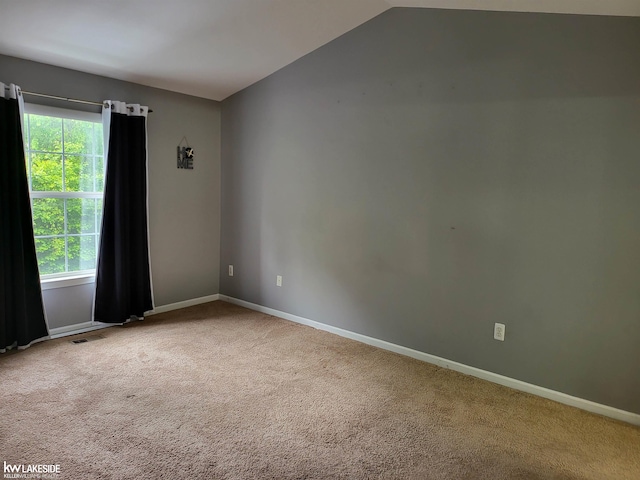 15495 Cornell Dr, Clinton Township, MI 48038 - carpeted spare room featuring baseboards and lofted ceiling