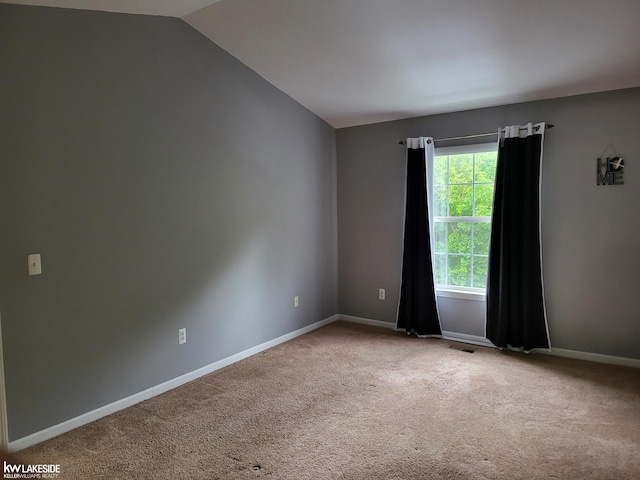 15495 Cornell Dr, Clinton Township, MI 48038 - unfurnished room with carpet, lofted ceiling, and baseboards
