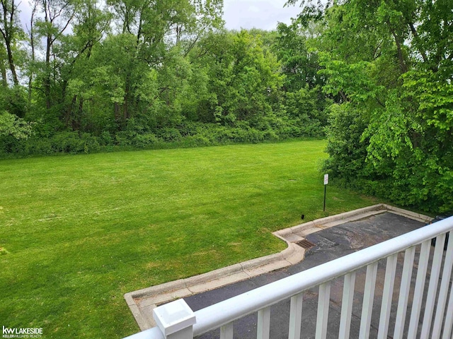 15495 Cornell Dr, Clinton Township, MI 48038 - view of grassy yard featuring a balcony