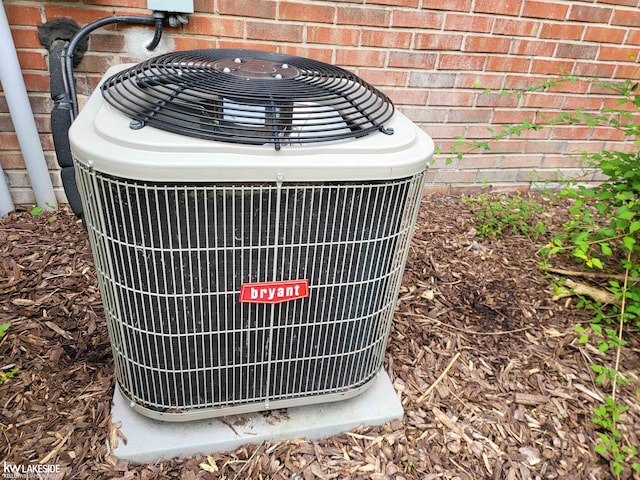 15495 Cornell Dr, Clinton Township, MI 48038 - exterior view of central AC unit and brick siding