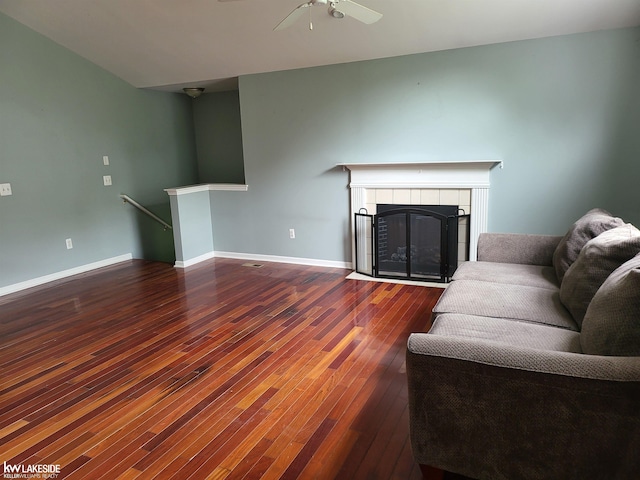 15495 Cornell Dr, Clinton Township, MI 48038 - living room featuring wood-type flooring, ceiling fan, a tile fireplace, and baseboards
