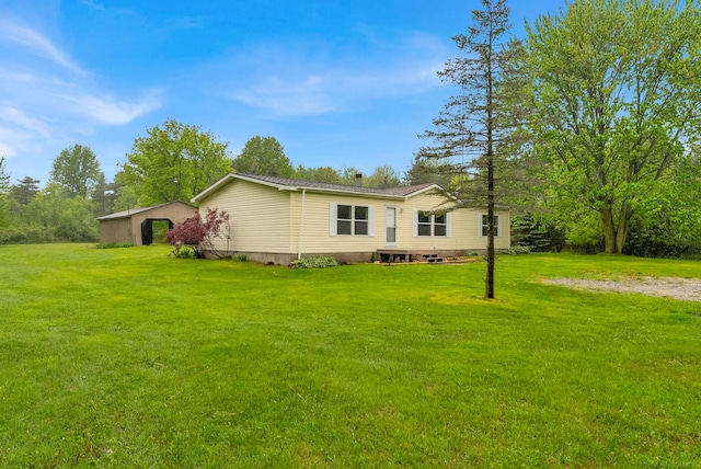 2100 Rowe Rd, Applegate, MI 48401 - view of front of home with a front lawn and crawl space