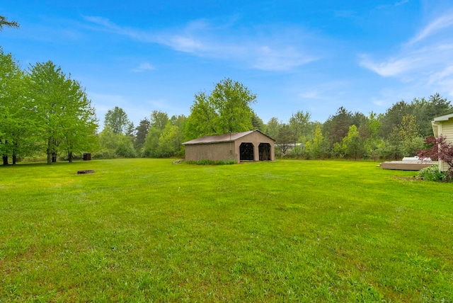 2100 Rowe Rd, Applegate, MI 48401 - view of grassy yard with a pole building and an outdoor structure