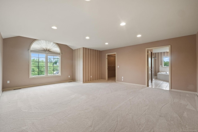 4931 Peggy St, West Bloomfield, MI 48322 - unfurnished room with recessed lighting, plenty of natural light, baseboards, light carpet, and vaulted ceiling