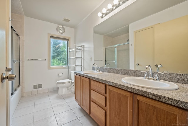 4931 Peggy St, West Bloomfield, MI 48322 - bathroom featuring double vanity, toilet, tile patterned floors, and shower / bath combination with glass door