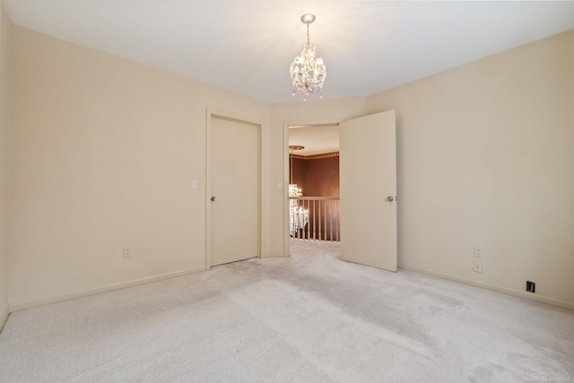 4931 Peggy St, West Bloomfield, MI 48322 - unfurnished room with a chandelier, carpet, and baseboards