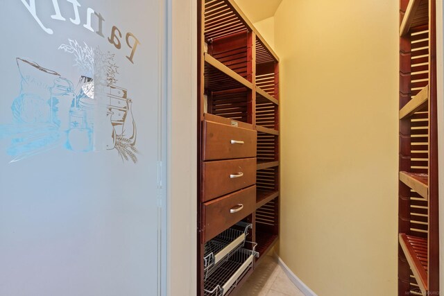 4931 Peggy St, West Bloomfield, MI 48322 - walk in closet with tile patterned flooring and radiator