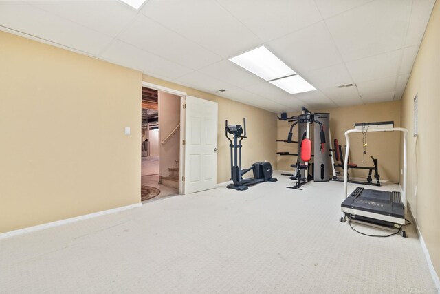 4931 Peggy St, West Bloomfield, MI 48322 - exercise area featuring a drop ceiling, baseboards, and carpet flooring