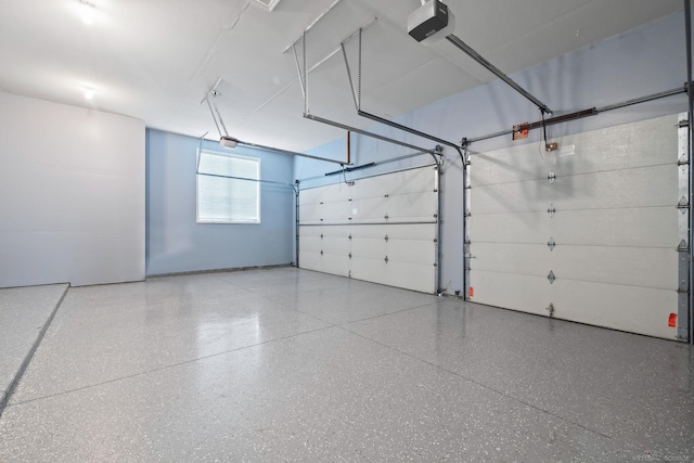4931 Peggy St, West Bloomfield, MI 48322 - garage featuring a garage door opener