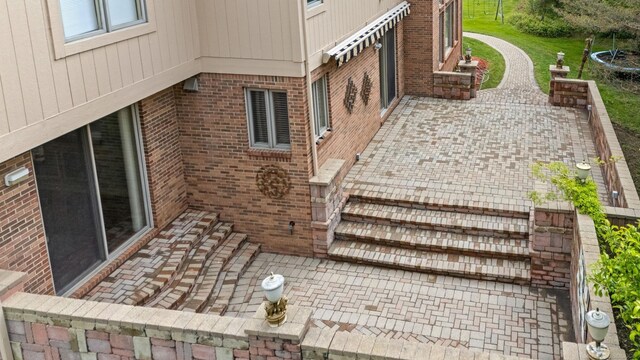 4931 Peggy St, West Bloomfield, MI 48322 - view of patio / terrace with decorative driveway