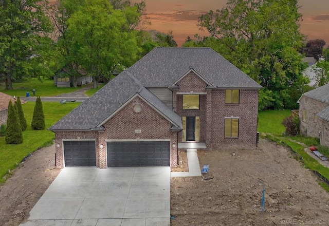 1110 Williamson Cir, Pontiac, MI 48340 - traditional home with a garage, concrete driveway, roof with shingles, and brick siding
