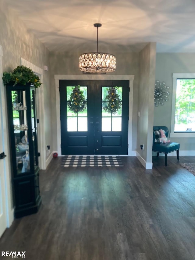 6665 Church Rd, Fair Haven, MI 48023 - foyer with baseboards, dark wood-style floors, and french doors