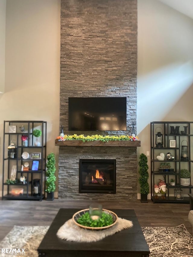 6665 Church Rd, Fair Haven, MI 48023 - living area with a stone fireplace and wood finished floors