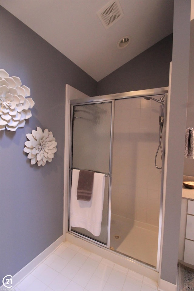 50887 Nature Dr, New Baltimore, MI 48047 - bathroom featuring vaulted ceiling, a stall shower, and vanity