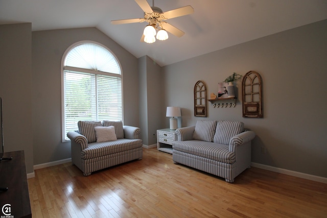 50887 Nature Dr, New Baltimore, MI 48047 - living area featuring light wood finished floors, lofted ceiling, a ceiling fan, and baseboards