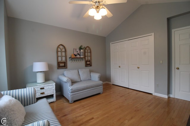 50887 Nature Dr, New Baltimore, MI 48047 - living area featuring a ceiling fan, lofted ceiling, light wood finished floors, and baseboards