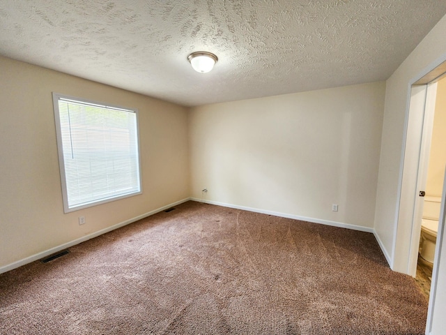 2521 Bonnie Mae Rd, Harrison, MI 48625 - carpeted spare room with baseboards and a textured ceiling