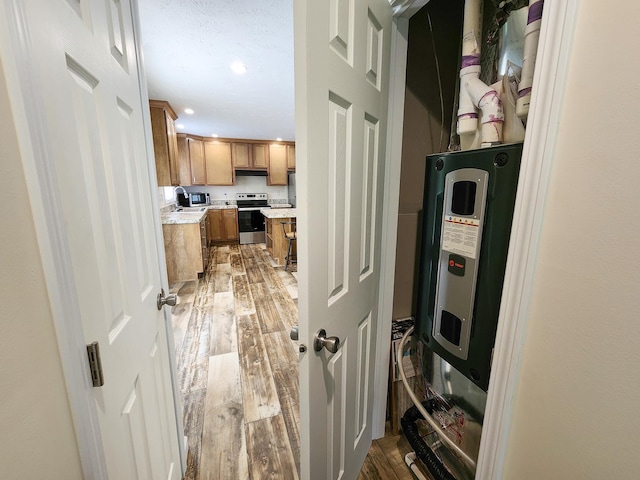 2521 Bonnie Mae Rd, Harrison, MI 48625 - utility room featuring water heater