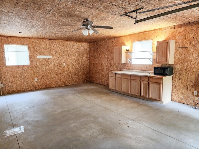 2521 Bonnie Mae Rd, Harrison, MI 48625 - garage with ceiling fan