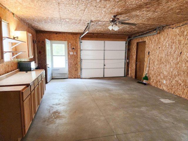 2521 Bonnie Mae Rd, Harrison, MI 48625 - garage with ceiling fan