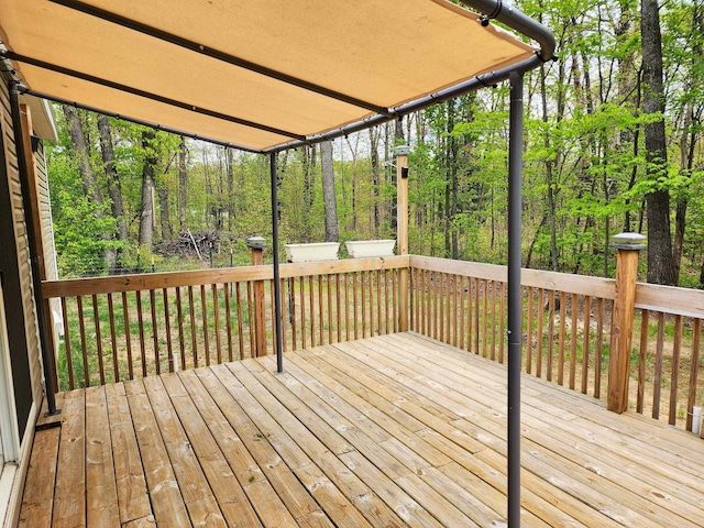 2521 Bonnie Mae Rd, Harrison, MI 48625 - wooden terrace featuring a view of trees