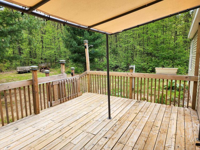 2521 Bonnie Mae Rd, Harrison, MI 48625 - wooden terrace with a forest view
