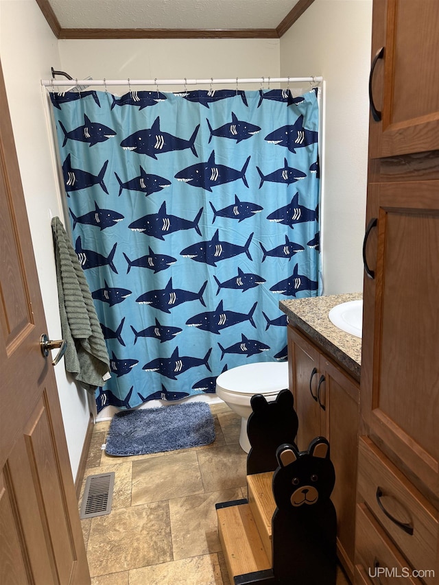 245 Silver Creek Rd, Marquette, MI 49855 - full bath featuring toilet, vanity, crown molding, a shower with curtain, and stone finish floors