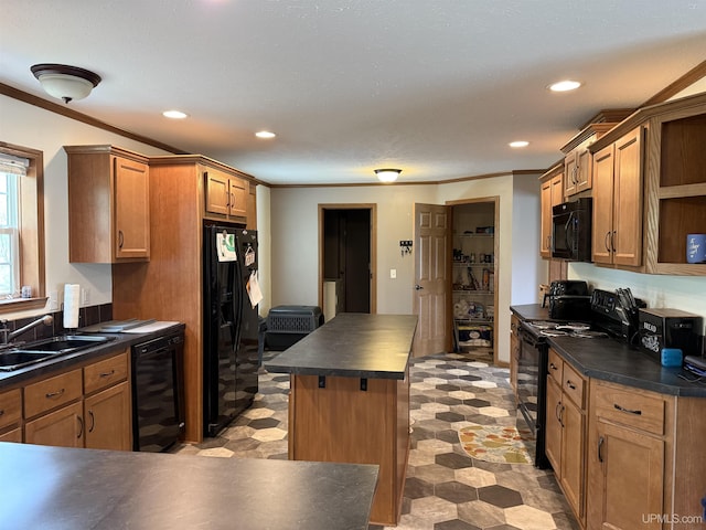 245 Silver Creek Rd, Marquette, MI 49855 - kitchen featuring black appliances, a sink, dark countertops, beverage cooler, and ornamental molding