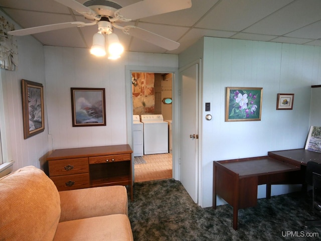 50 Baltic Ave, South Range, MI 49963 - carpeted living room with washer and clothes dryer, ceiling fan, and wooden walls