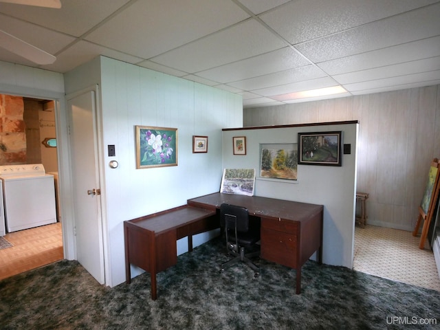 50 Baltic Ave, South Range, MI 49963 - home office with a drop ceiling, wooden walls, carpet, and independent washer and dryer