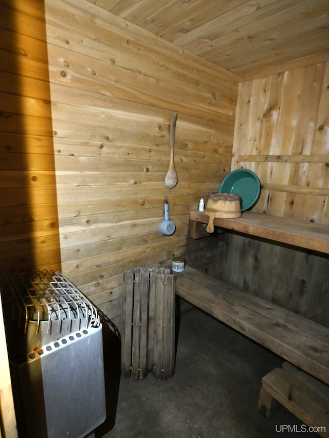50 Baltic Ave, South Range, MI 49963 - sauna featuring wooden walls, wood ceiling, and concrete floors