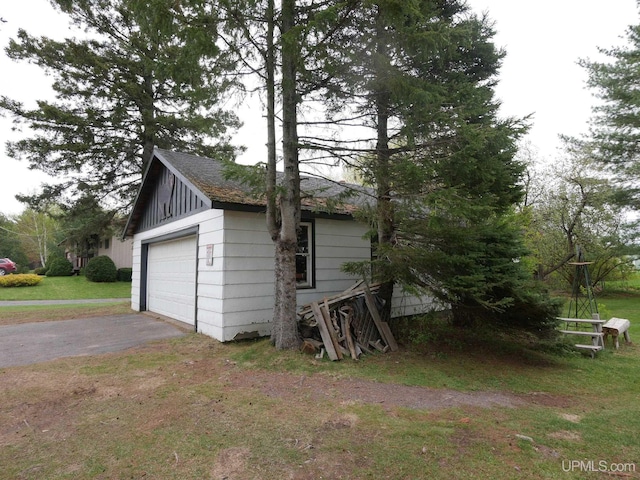 50 Baltic Ave, South Range, MI 49963 - garage with asphalt driveway