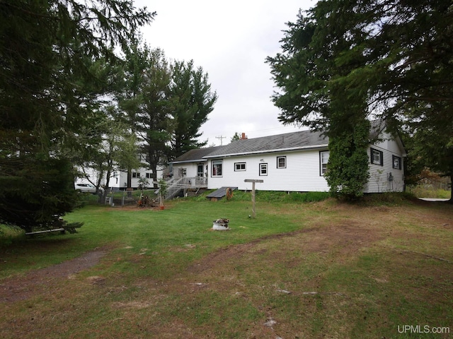 50 Baltic Ave, South Range, MI 49963 - back of house with a yard and a chimney