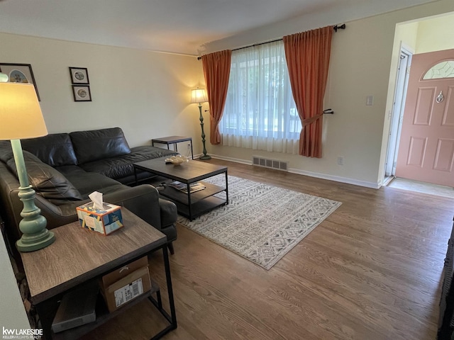 11527 Crown Dr, Sterling Heights, MI 48314 - living area with wood finished floors and baseboards