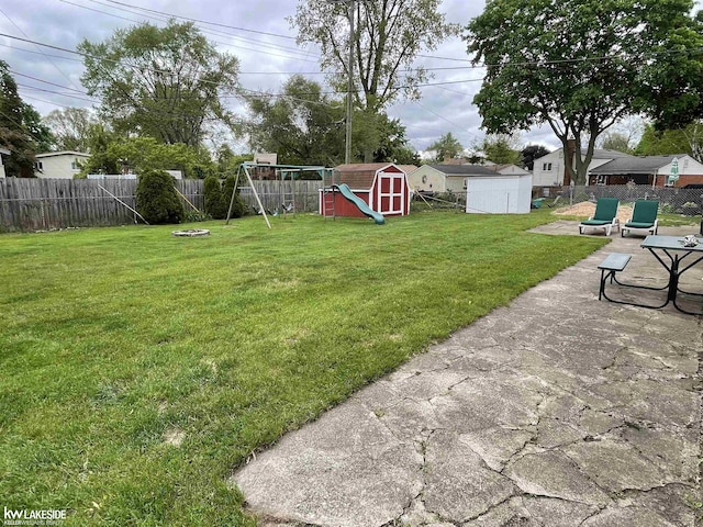 11527 Crown Dr, Sterling Heights, MI 48314 - view of yard featuring a playground and a patio area