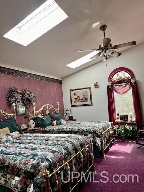 9411 Goodell Rd, Eagle Harbor, MI 49950 - bedroom with a skylight and carpet flooring