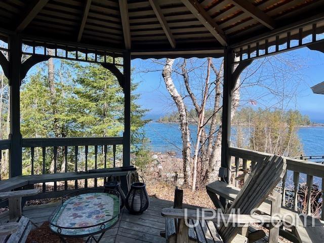 9411 Goodell Rd, Eagle Harbor, MI 49950 - wooden deck with a water view and a gazebo