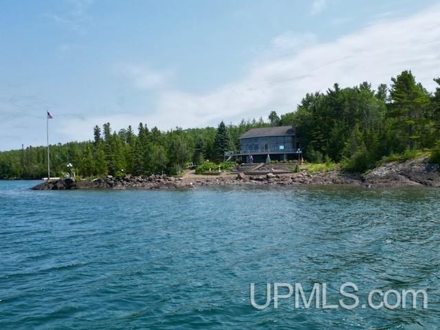 9411 Goodell Rd, Eagle Harbor, MI 49950 - water view featuring a heavily wooded area