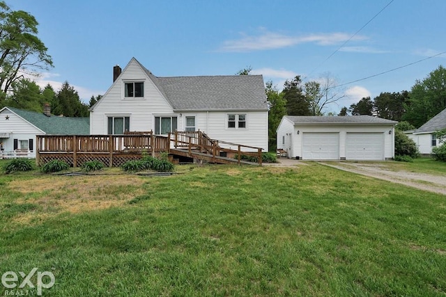 6198 Griswold Rd, Kimball, MI 48074 - back of property featuring a garage, an outdoor structure, a chimney, a deck, and a yard