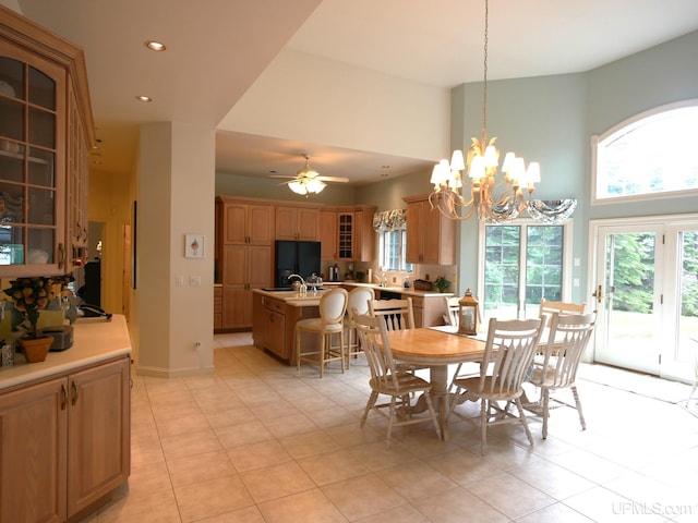 52765 Bootjack Rd, Lake Linden, MI 49945 - dining area featuring a towering ceiling, healthy amount of natural light, light tile patterned flooring, recessed lighting, and a chandelier