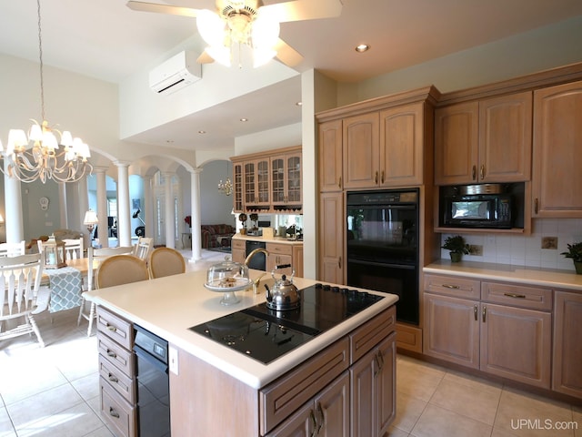 52765 Bootjack Rd, Lake Linden, MI 49945 - kitchen with ornate columns, black appliances, light tile patterned floors, an AC wall unit, and recessed lighting