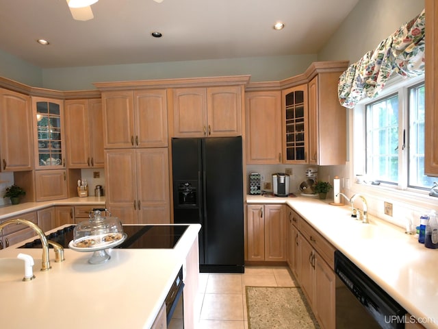 52765 Bootjack Rd, Lake Linden, MI 49945 - kitchen with black appliances, light tile patterned flooring, glass insert cabinets, recessed lighting, and a sink