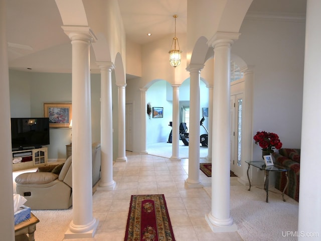 52765 Bootjack Rd, Lake Linden, MI 49945 - entryway with light tile patterned floors, a towering ceiling, and ornamental molding