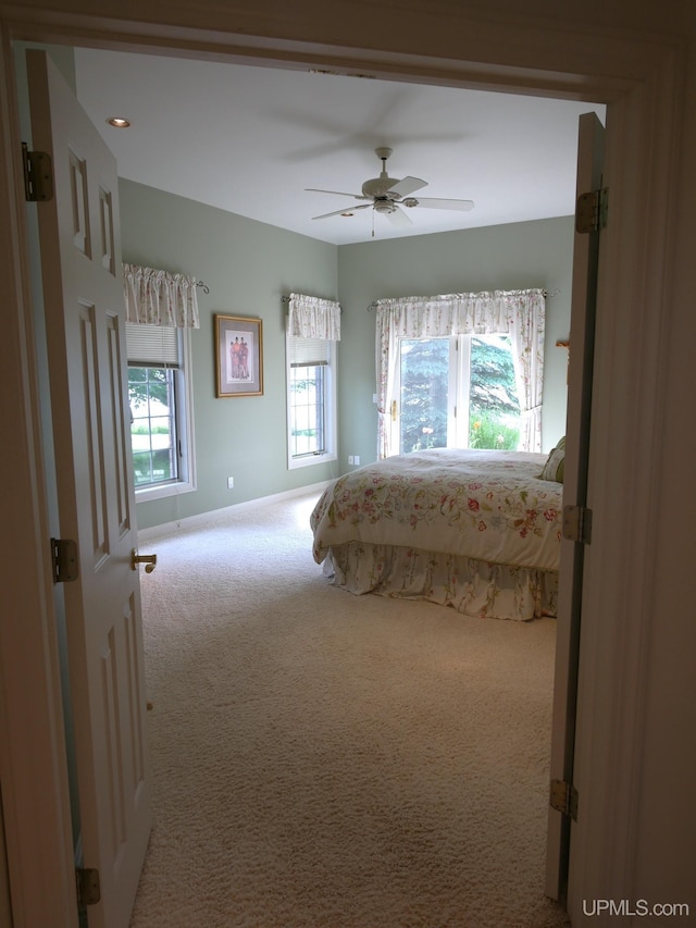 52765 Bootjack Rd, Lake Linden, MI 49945 - carpeted bedroom featuring baseboards and a ceiling fan