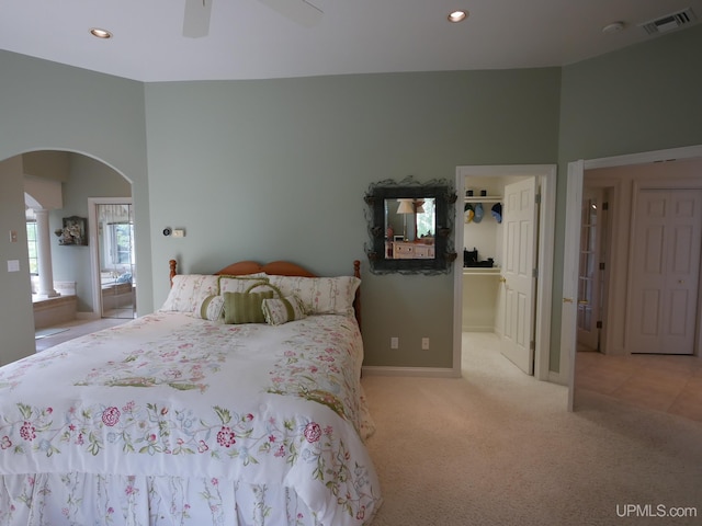 52765 Bootjack Rd, Lake Linden, MI 49945 - carpeted bedroom featuring arched walkways, recessed lighting, a walk in closet, ceiling fan, and a closet