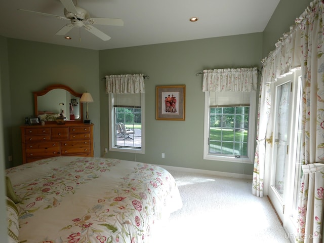 52765 Bootjack Rd, Lake Linden, MI 49945 - carpeted bedroom with multiple windows, baseboards, ceiling fan, access to outside, and recessed lighting